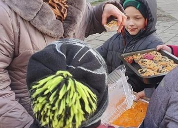 Uśmiech za kawałek ciasta grafika