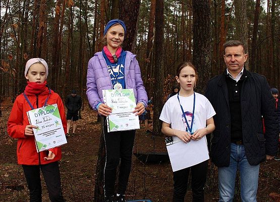 Deszcz, błoto idwa medale grafika